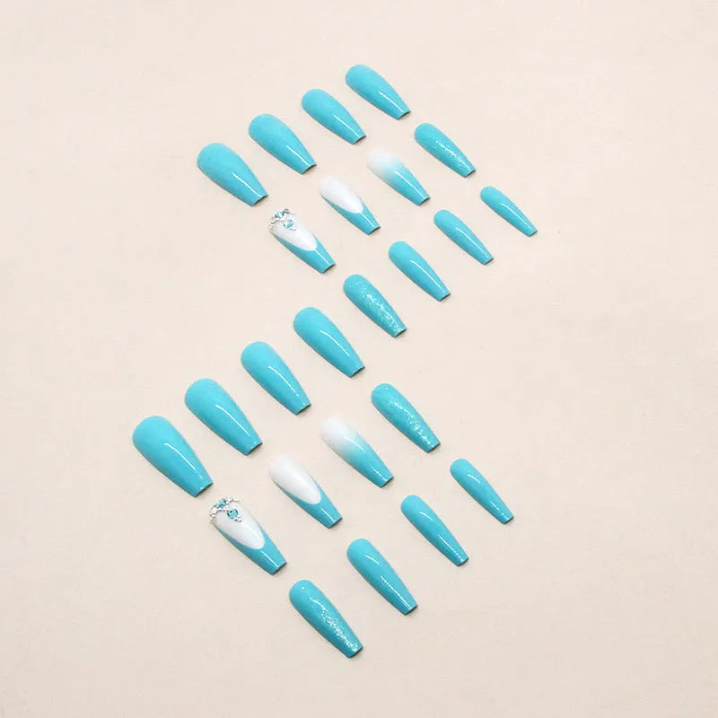 Long ballet false nails in smart blue diamond colour with adhesive glue