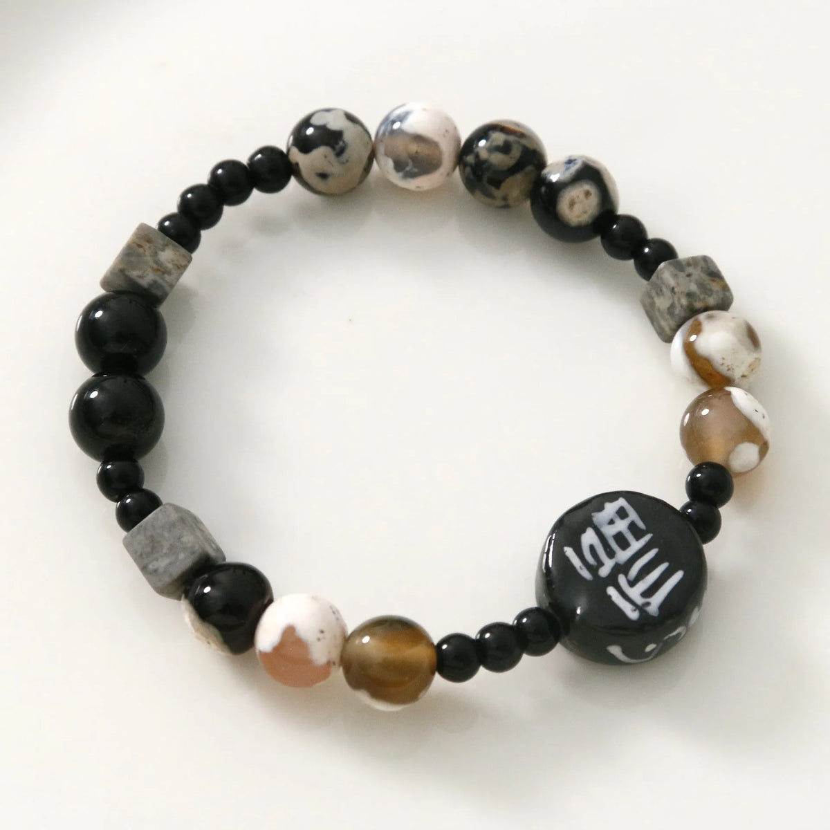 Hand-woven black agate ceramic bracelet with natural stone geometric round beads, unisex design