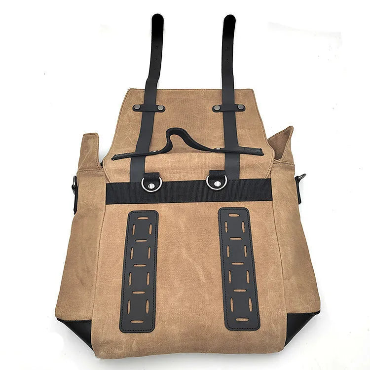 Motorcycle side bag with waterproof canvas construction showing mounting straps and main compartment