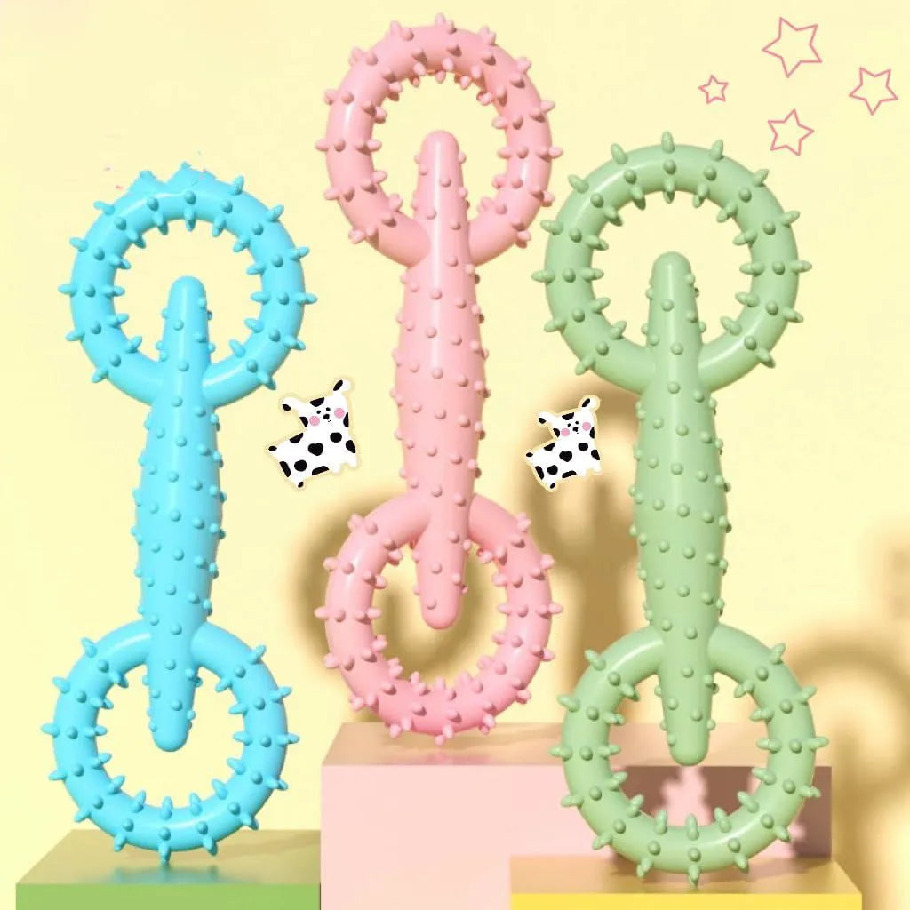 Blue TPR ring dog chew toy for puppies on a plain background.