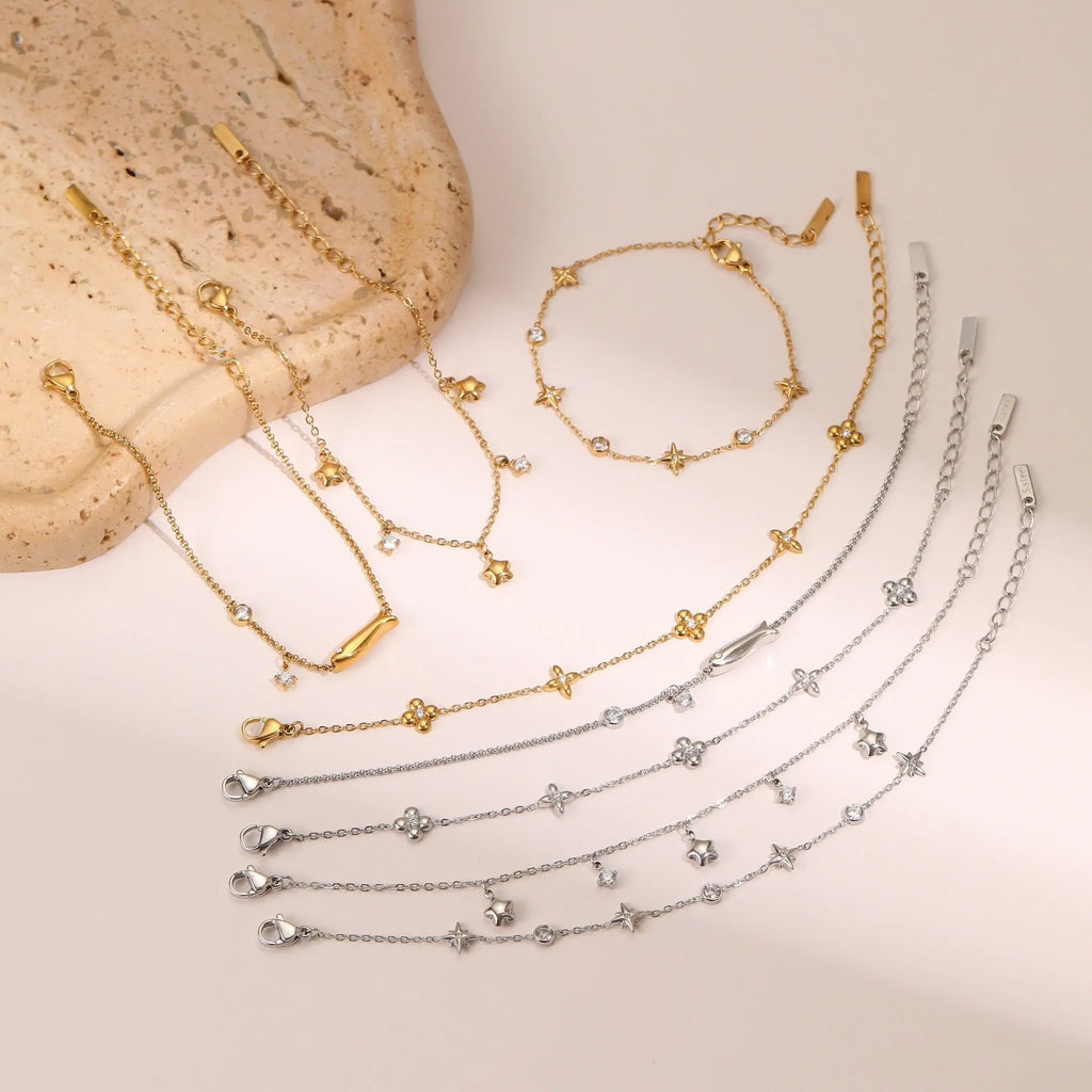 Women's stainless steel bracelet with 18K gold plating and zircon geometric star pendant