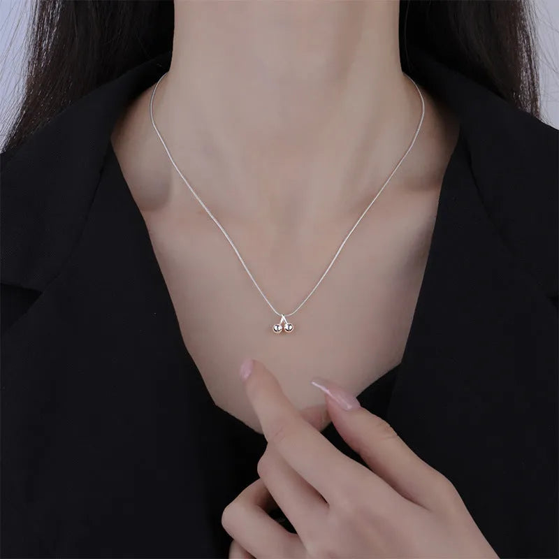 S925 sterling silver cherry necklace on adjustable snake bone chain for women.