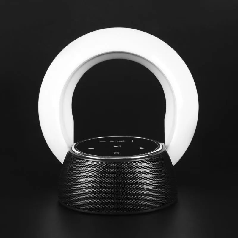 Blue plastic Bluetooth desk lamp speaker with folded LED light and touch controls