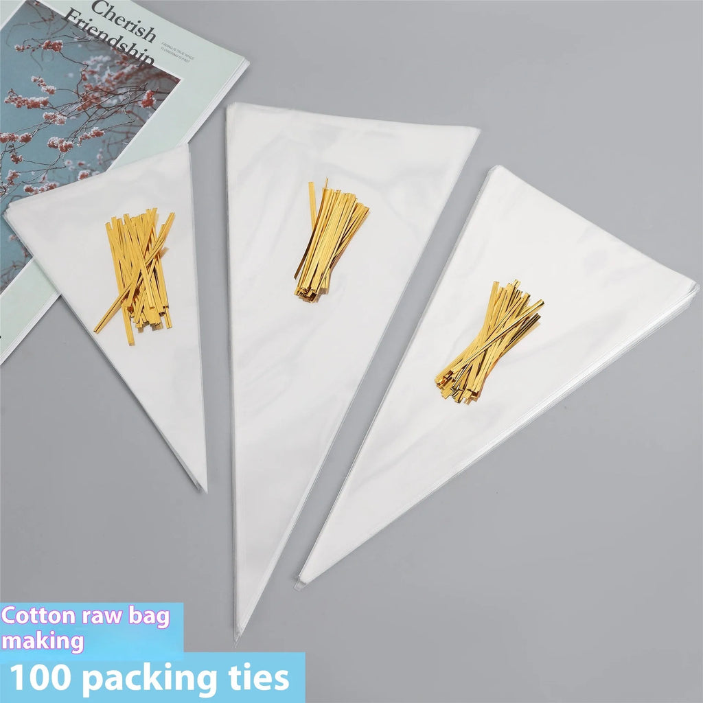 Clear triangle-shaped plastic packaging bags with a twisted wire tie closure on a white background.