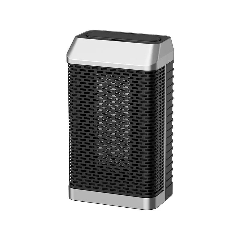 Black remote control desktop warm air blower heater with compact design on wooden surface