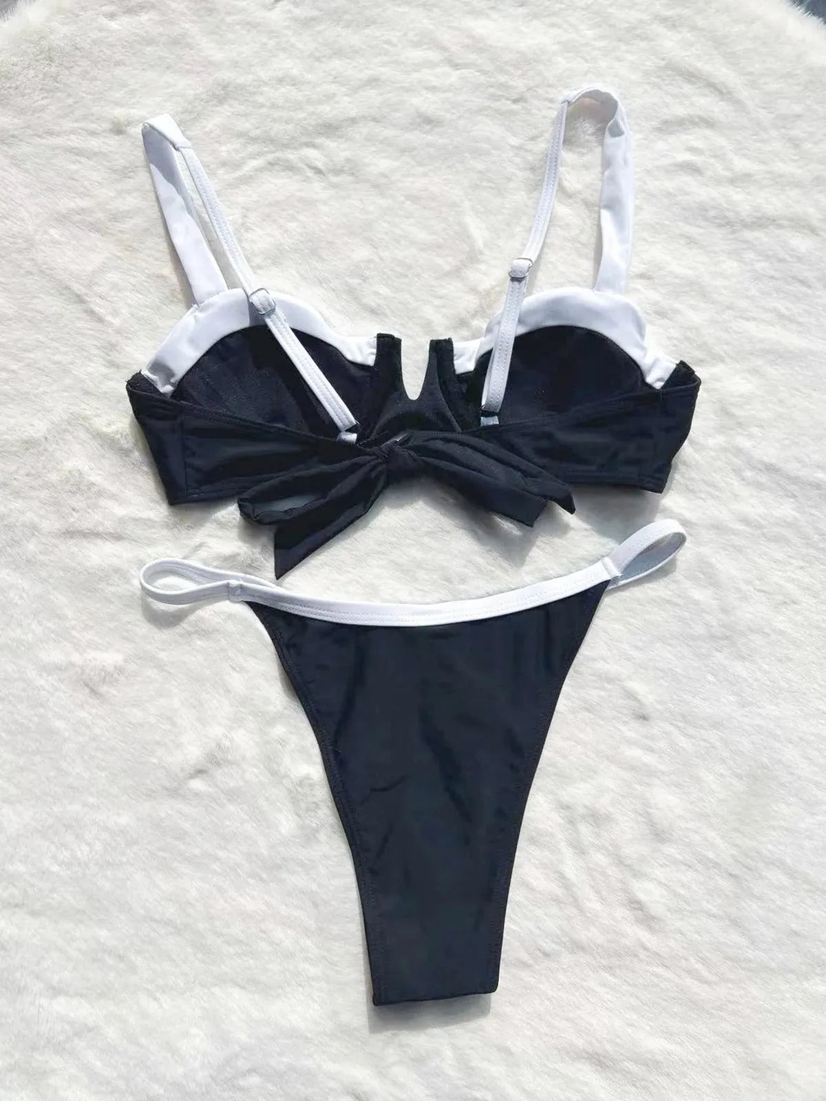 Black women's low waist bikini with stitching split detail, nylon and spandex swimsuit