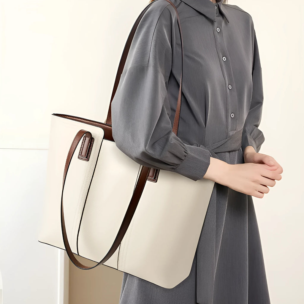 Women's genuine leather crossbody commuter bag with multiple interior compartments in horizontal square design