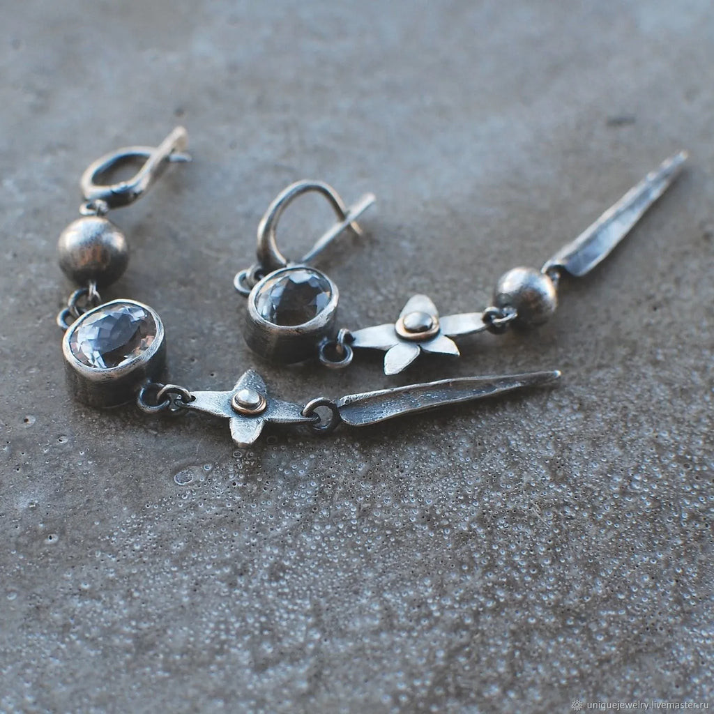 Geometric antique silver long pendant earrings with XINGX design and rhinestone details