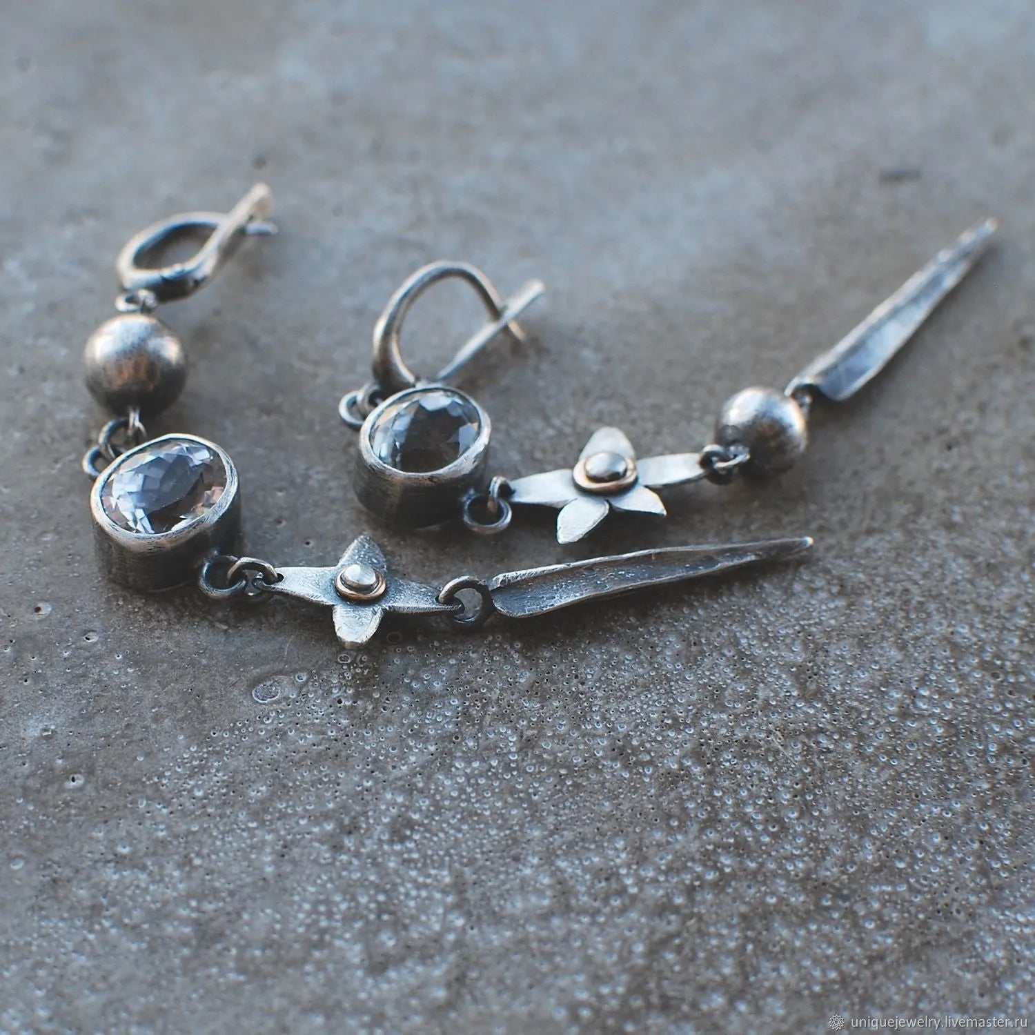 Geometric antique silver long pendant earrings with XINGX design and rhinestone details