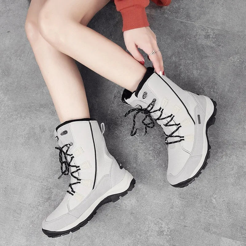 Women's mid-calf thermal snow boots in genuine leather with round toe, available in multiple colours