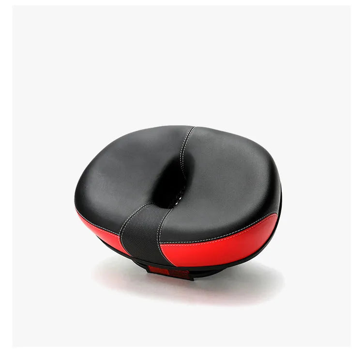 Large red bicycle saddle with reflective stickers and shock absorber for plus-size riders