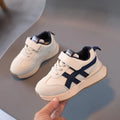 Children's white synthetic leather sneakers with Velcro strap and rubber sole in size 25