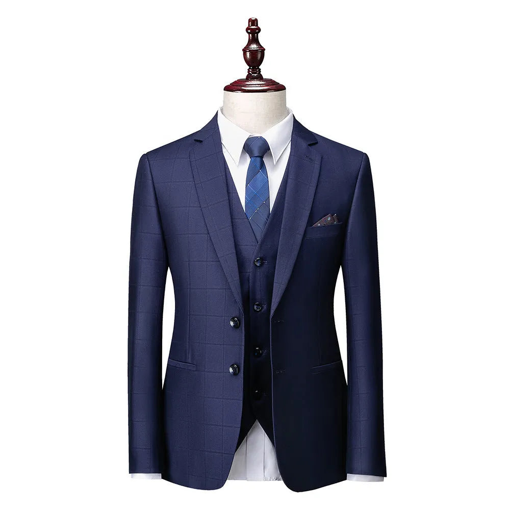 Men's navy blue plaid slim fit three-piece business casual suit with vest, jacket, and trousers