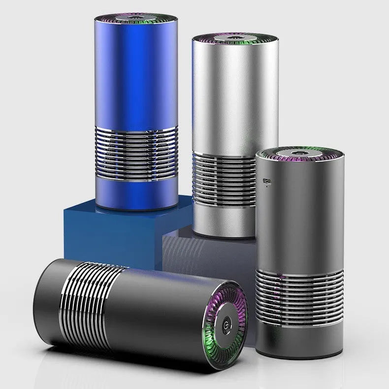 Compact cylindrical car air purifier in metallic grey showing 65mm diameter, with USB power cable.