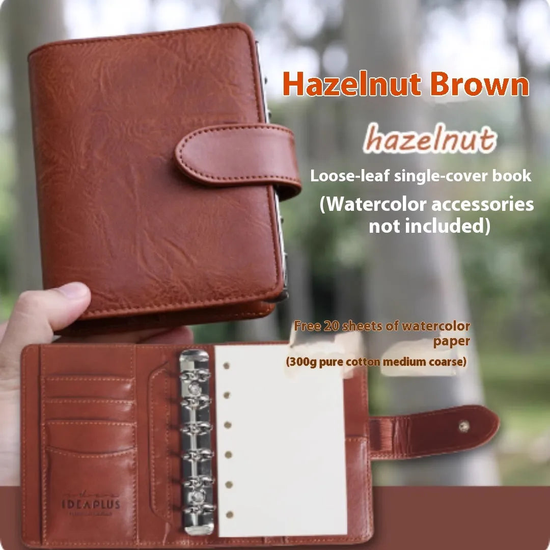 A7 mini loose-leaf watercolour notebook in one of five colours: green, brown, yellow, coffee, or dark green.