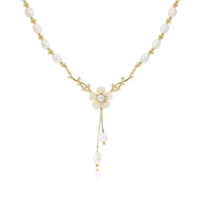 Alloy fashion necklace with pearl flower design and rose floral elements on pearl chain