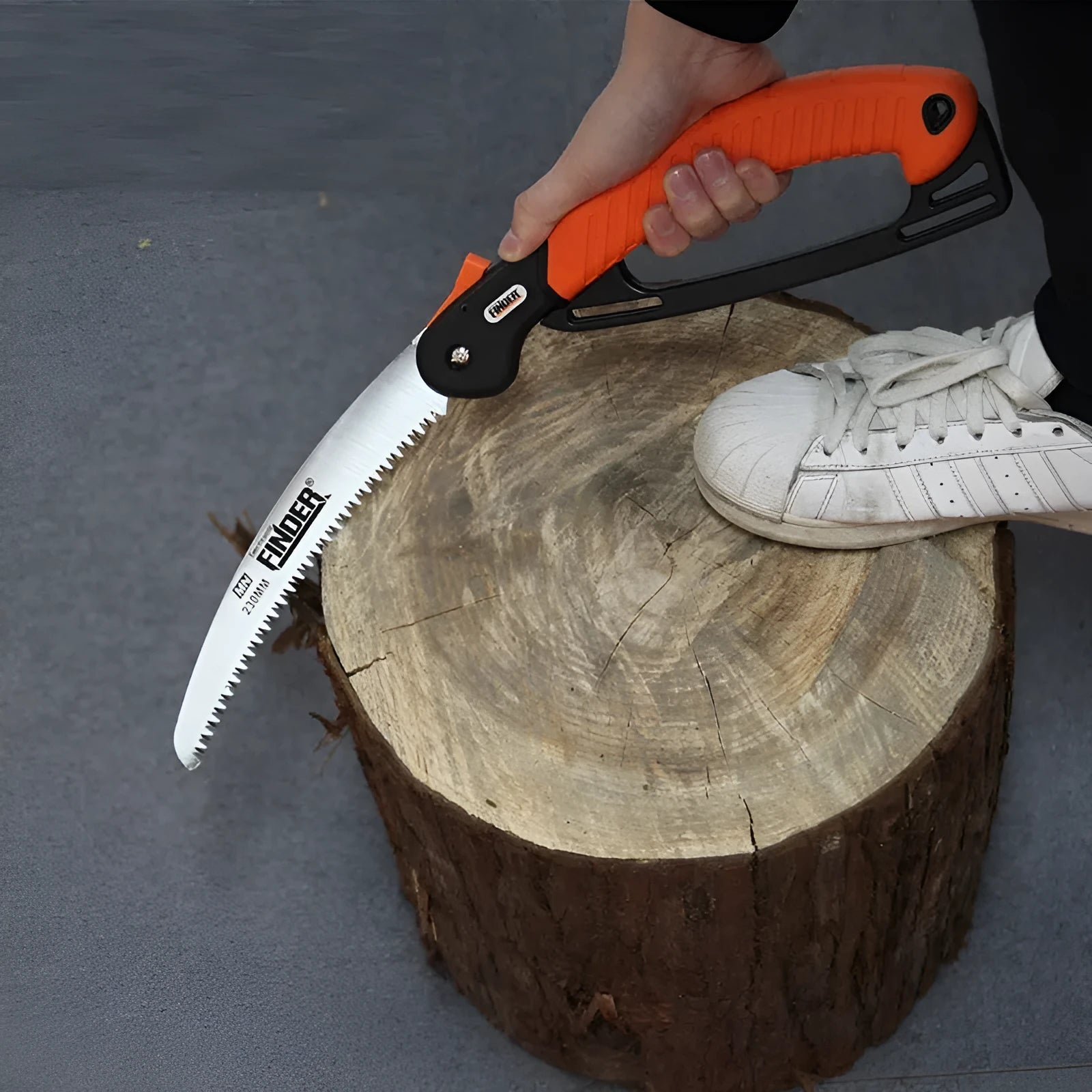 9-inch folding garden saw with TPR grip handle showing extended and folded positions