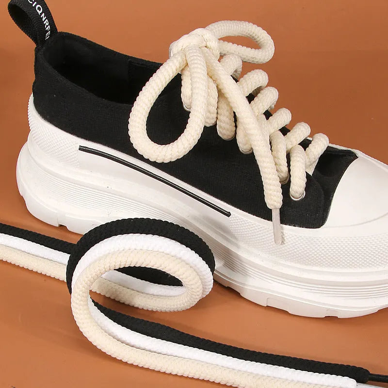 Round woven shoelaces in white, beige and black colours showing 10mm diameter construction