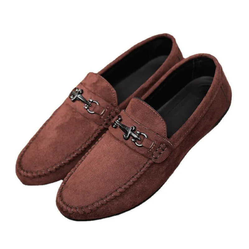 Men's black and brown waterproof slip-on loafers with round toe and low heel on a white background.