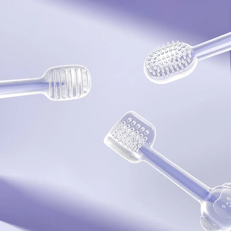 Purple pet toothbrush with flexible silicone head for cleaning cat and dog teeth