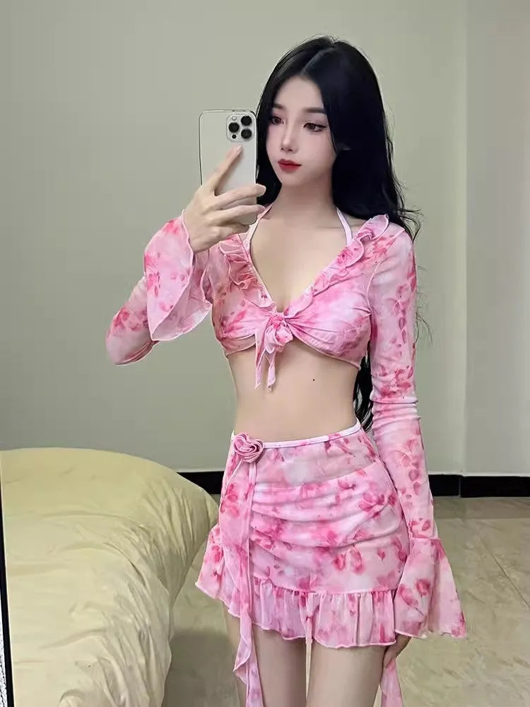 Cherry blossom pink women's floral bikini swimsuit laid flat