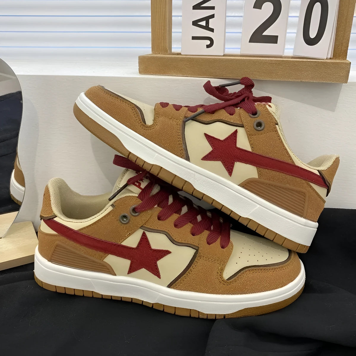 Brown women's low-top platform sneakers with sequin accents and front lace-up closure