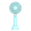 Blue portable USB handheld fan with three-speed control on desktop