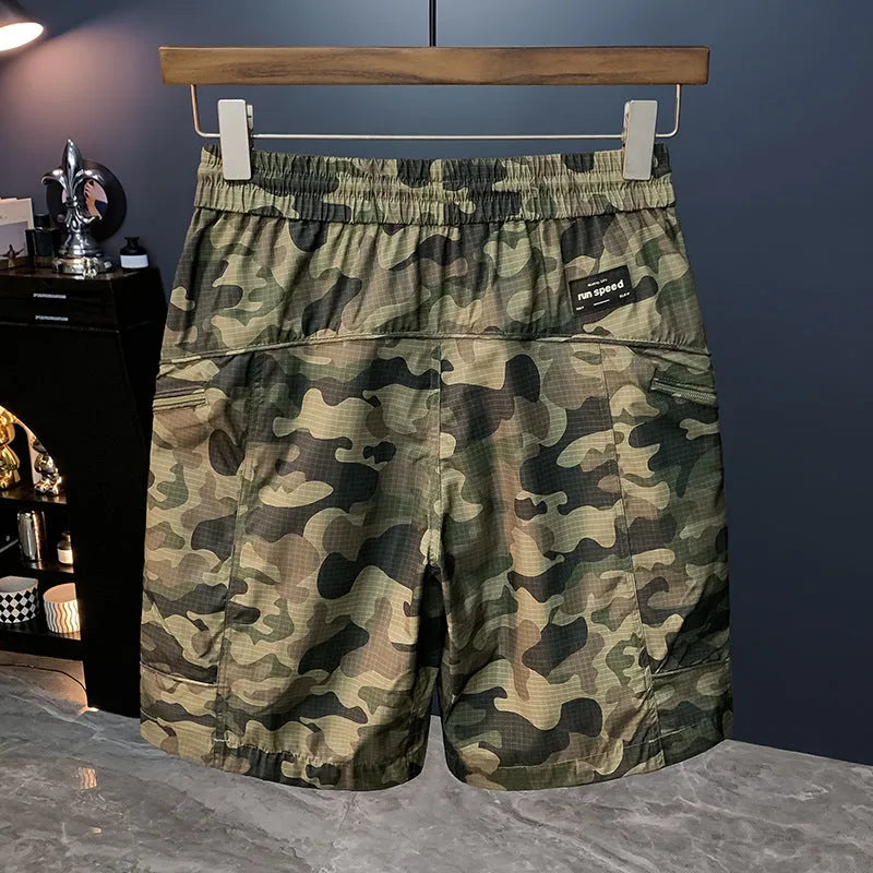 Men's camouflage cargo shorts with cargo pockets and loose fit design