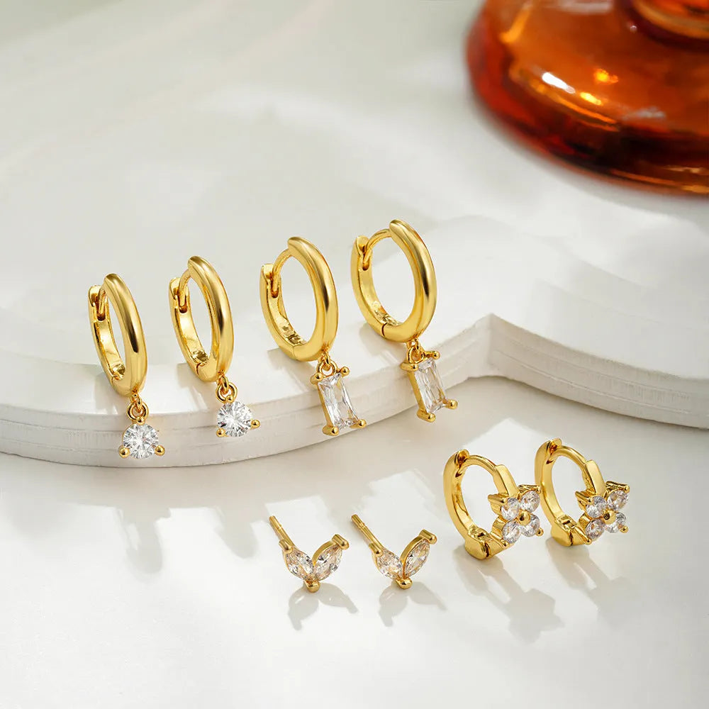 Geometric square earrings set with star shapes in gold or silver electroplated finish