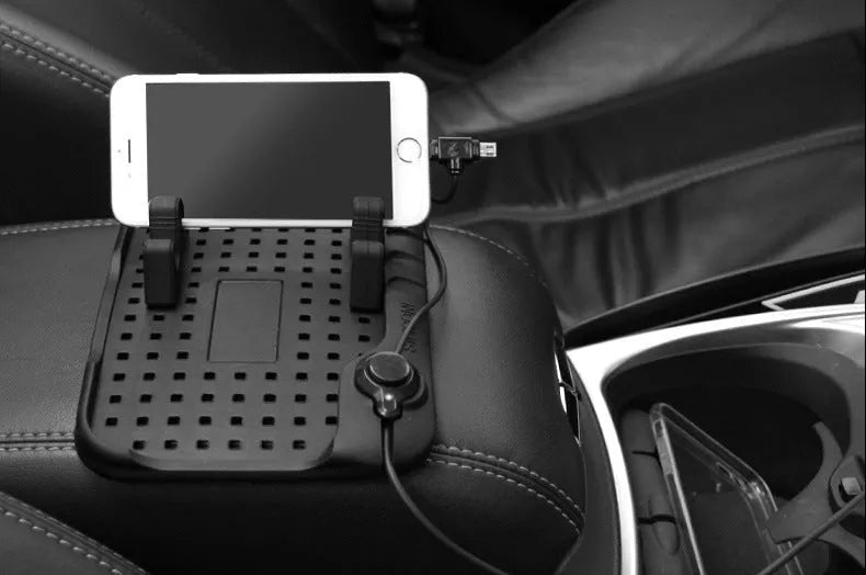 Black silicone car charging bracket mobile phone holder, 11x9.2cm, with magnetic charger and adjustable dashboard pad.