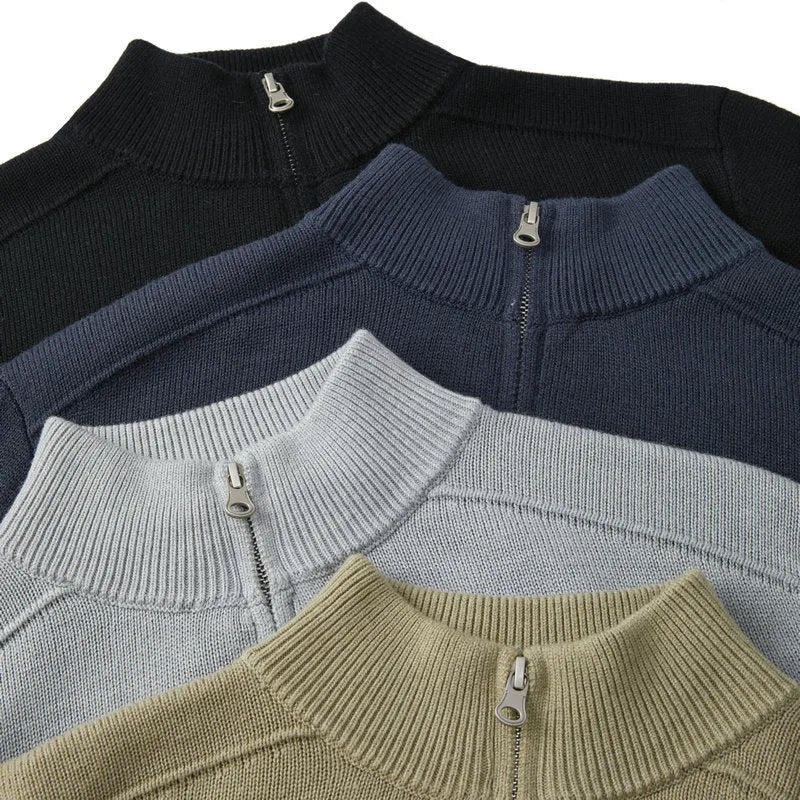 Men's slim-fit wool pullover sweater in a stone sand colour, showing long sleeves and casual style.