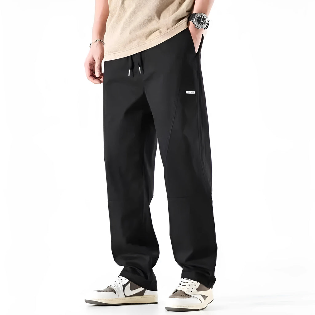Women's cotton wide-leg trousers with pants-mouth cuff in white and black colours