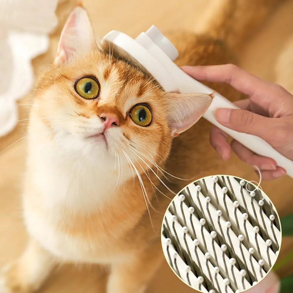 Blue self-cleaning cat brush with rubber-tipped metal pins and a non-slip handle.