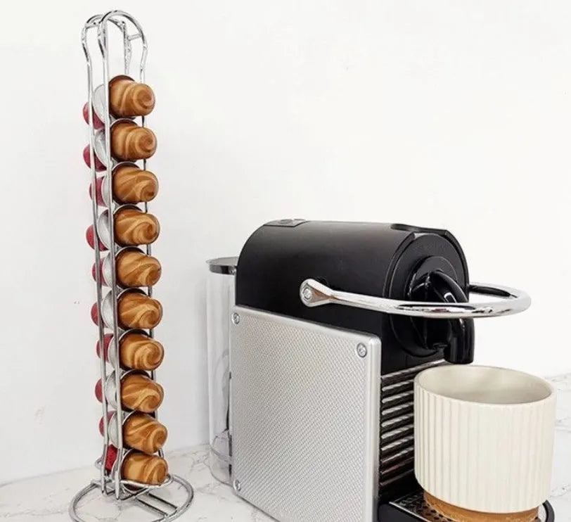 Black wrought iron coffee capsule storage rack holding 20 capsules on display shelves