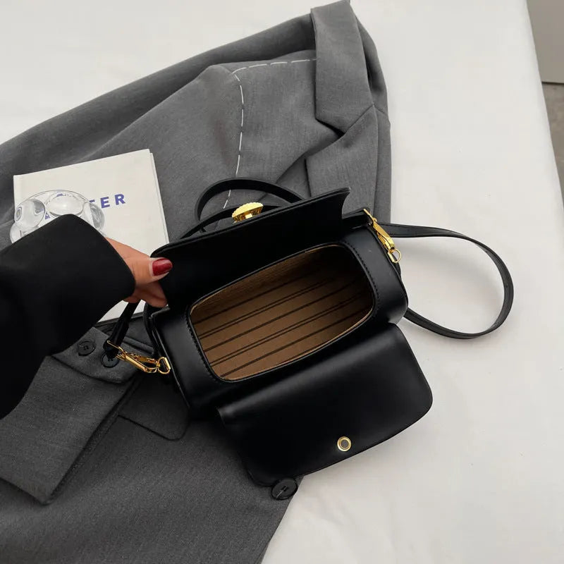 Women's personalised PU shoulder bag with letter stitching in beige, showing messenger-style strap and structured shape