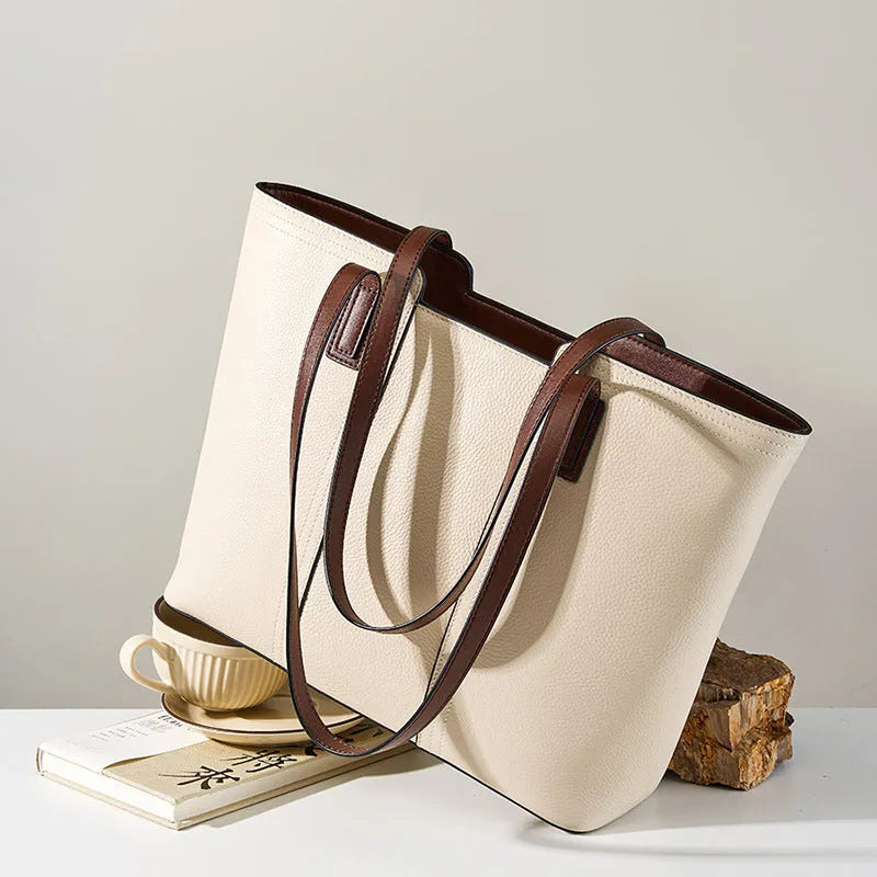 Women's genuine leather crossbody commuter bag with multiple interior compartments in horizontal square design