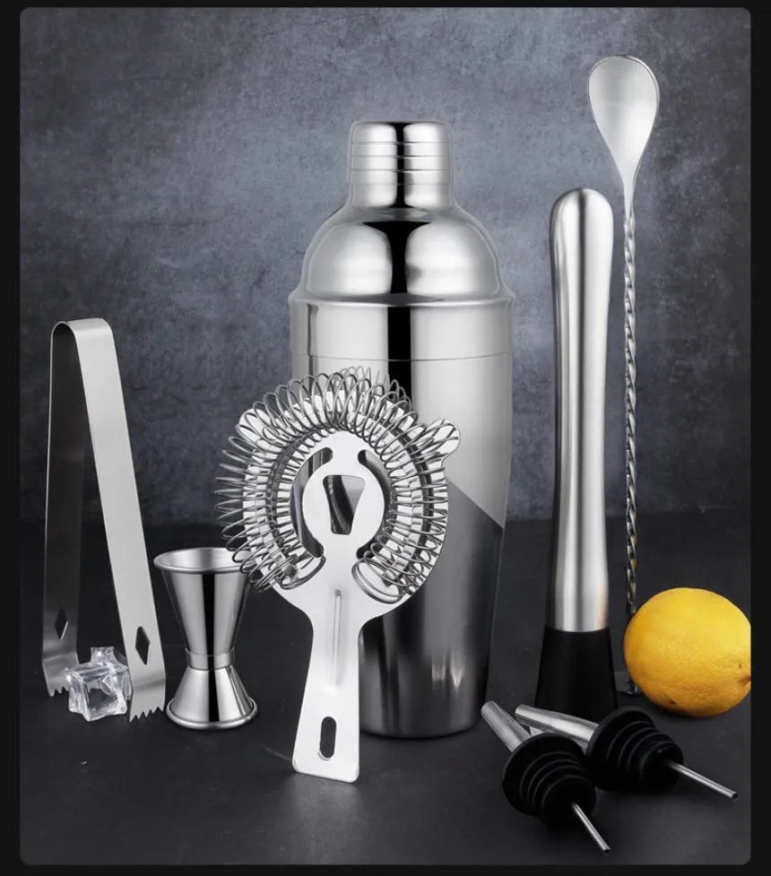 23-piece stainless steel cocktail set with acrylic shaker on home bar
