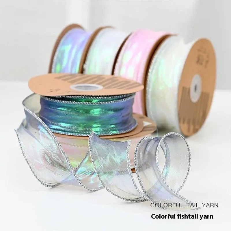 Mesh fishtail yarn ribbon with colourful wave edge in multiple illusion colour options for DIY craft projects.