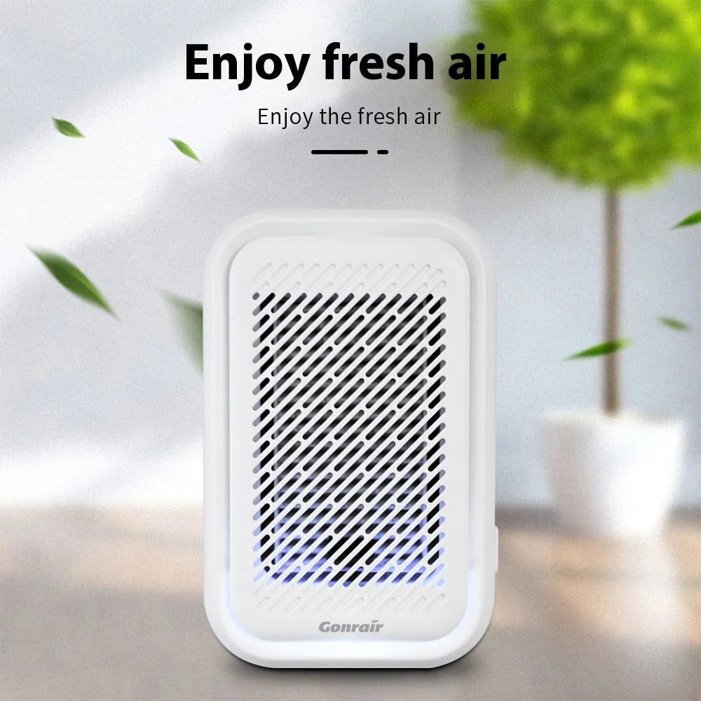 White wall-mounted air purifier with direct plug-in power cord and filter screen