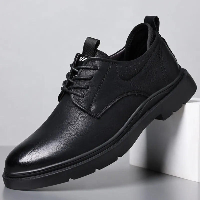 Men's black and brown breathable leather business shoes with rubber sole and sewing line detailing