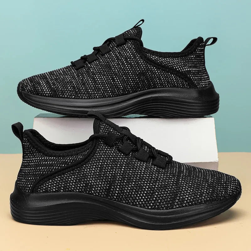 Women's low-top mesh casual sneakers in black with lace-up front and round toe
