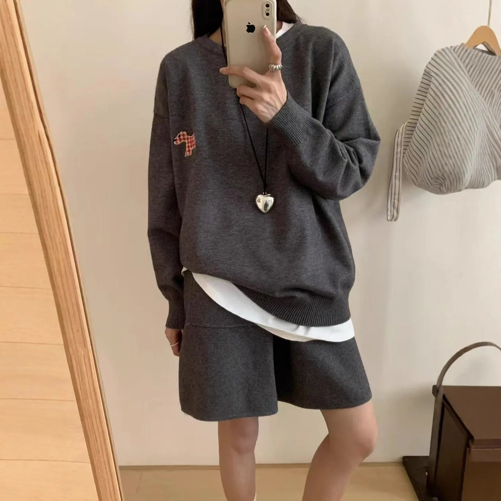 Women's milk blue casual knitted sweater and shorts suit with animal pattern embroidery.