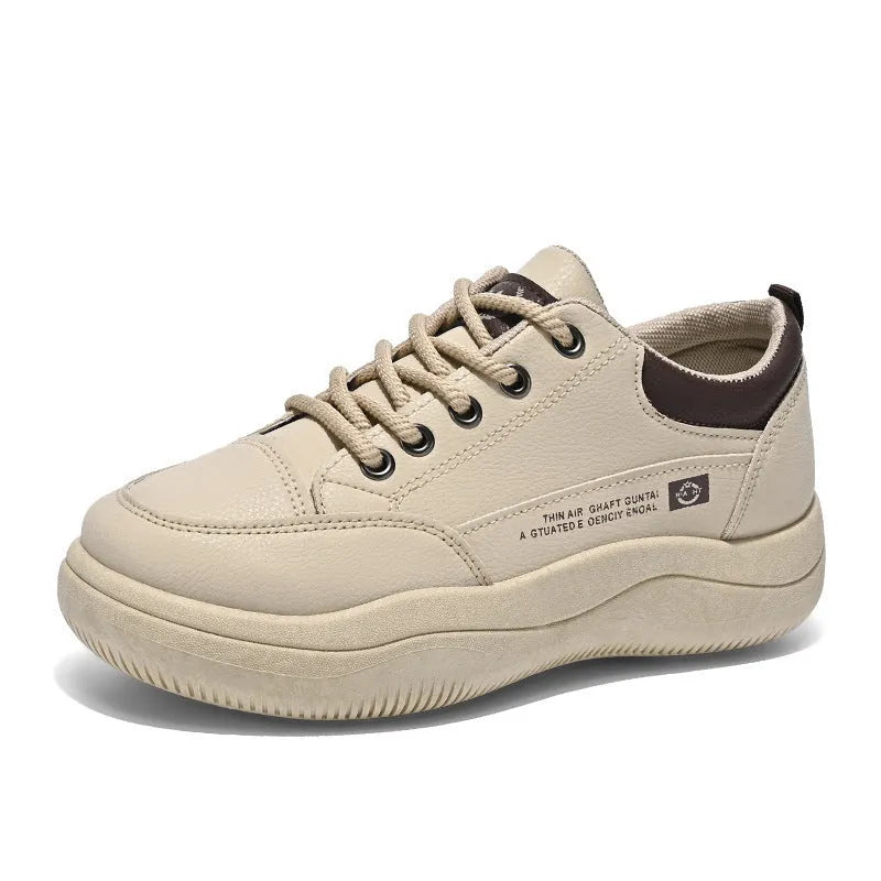 Women's white Korean-style lace-up pumps with cross straps and round toe, showing leather stitching details