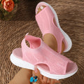 Women's beige platform sports sandals with a flat toe and rubber sole.