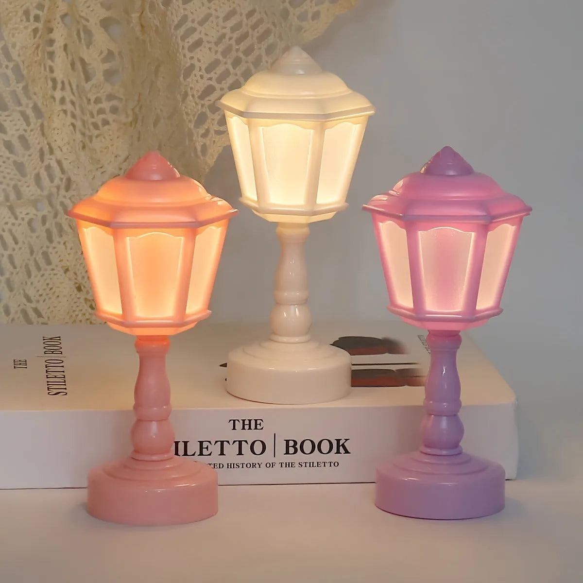 Retro pagoda shaped geometric night lamp in light purple colour with LED illumination