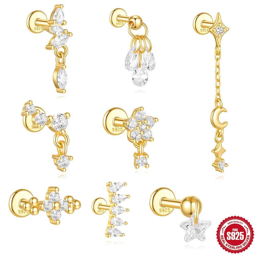 S925 sterling silver moon and star shaped earrings with embedded diamond details in a gold tone finish.