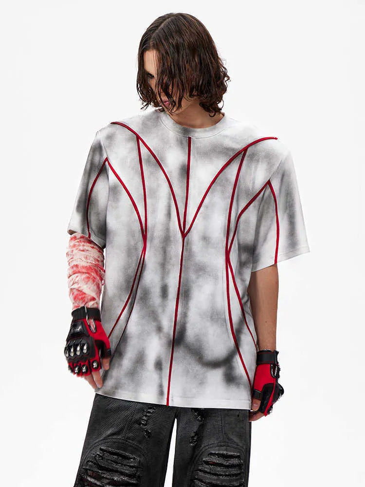 Women's padded shoulder t-shirt with textured patchwork design on short sleeves and round neck