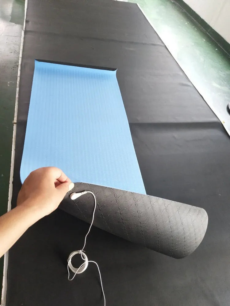 Blue conductive yoga mat with grounding wire, showing plant pattern and 182cm length.