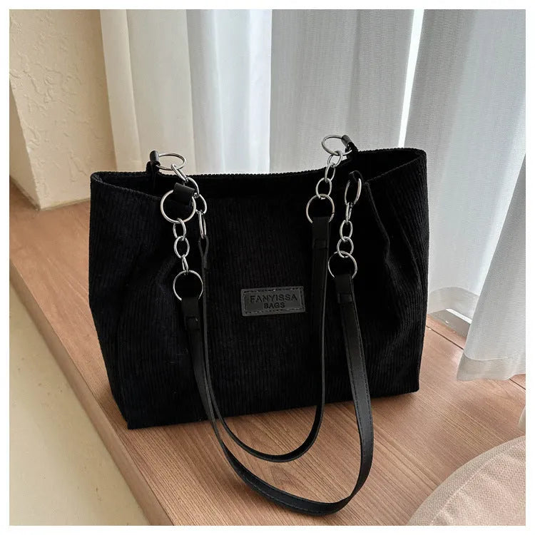 Corduroy tote handbag for women showing large capacity design and one-shoulder strap