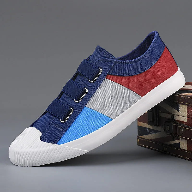 Men's low-top canvas sneakers in beige with an elastic band and vulcanised rubber sole.